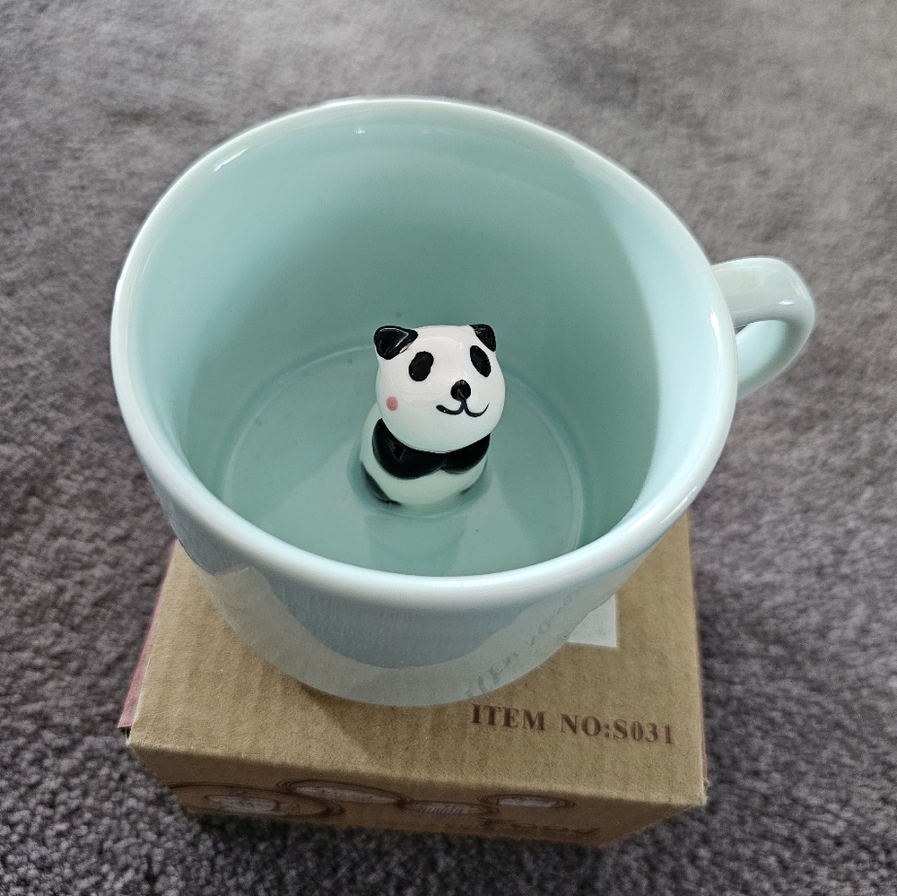 Surprise ceramic panda mug NIB